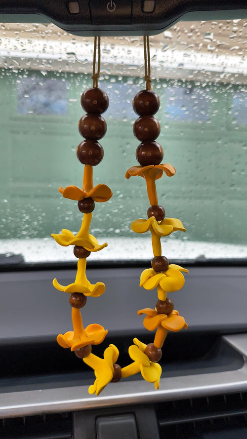 Car lei with handmade clay puakenikeni