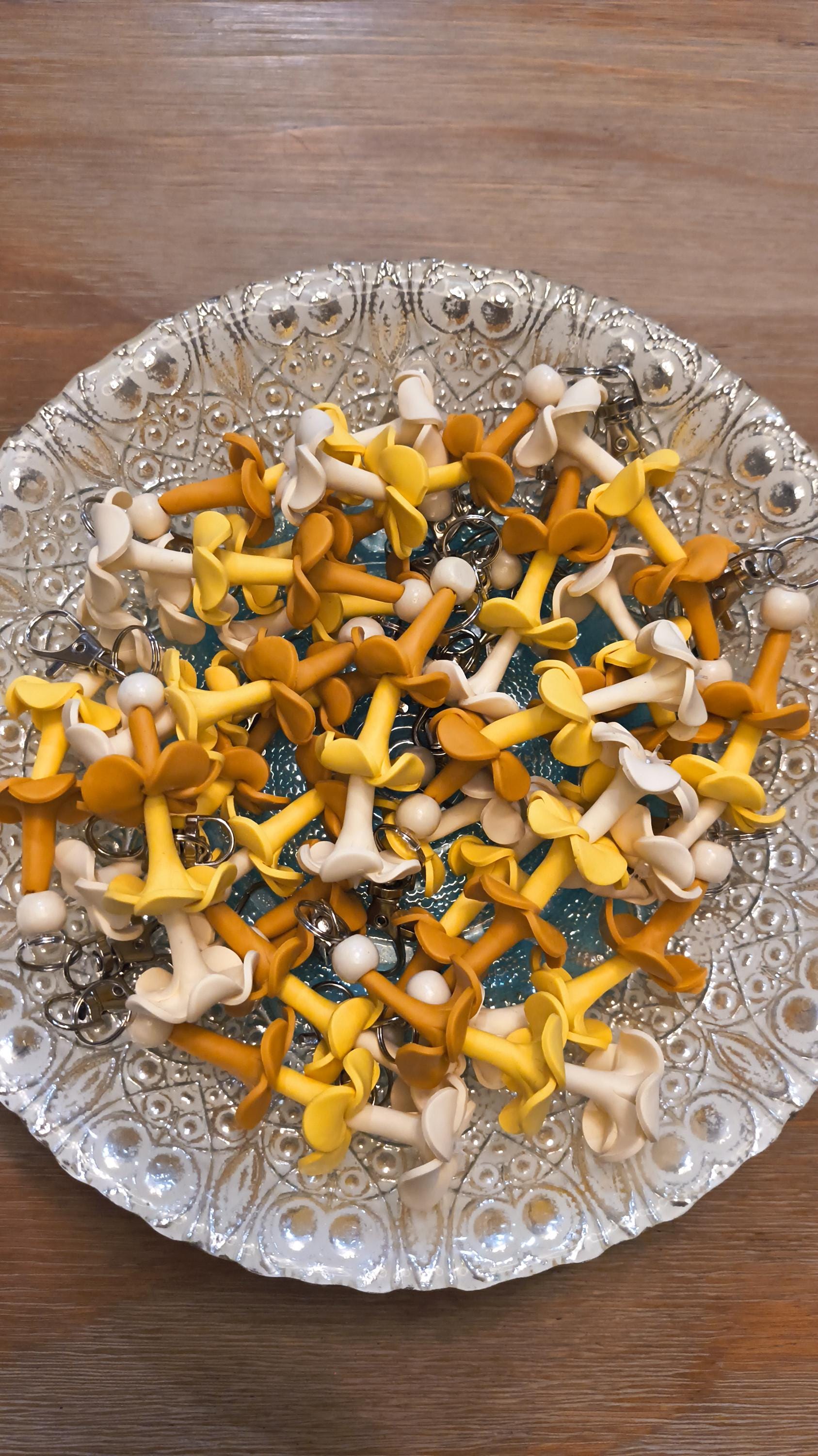 Keychain with handmade clay puakenikeni