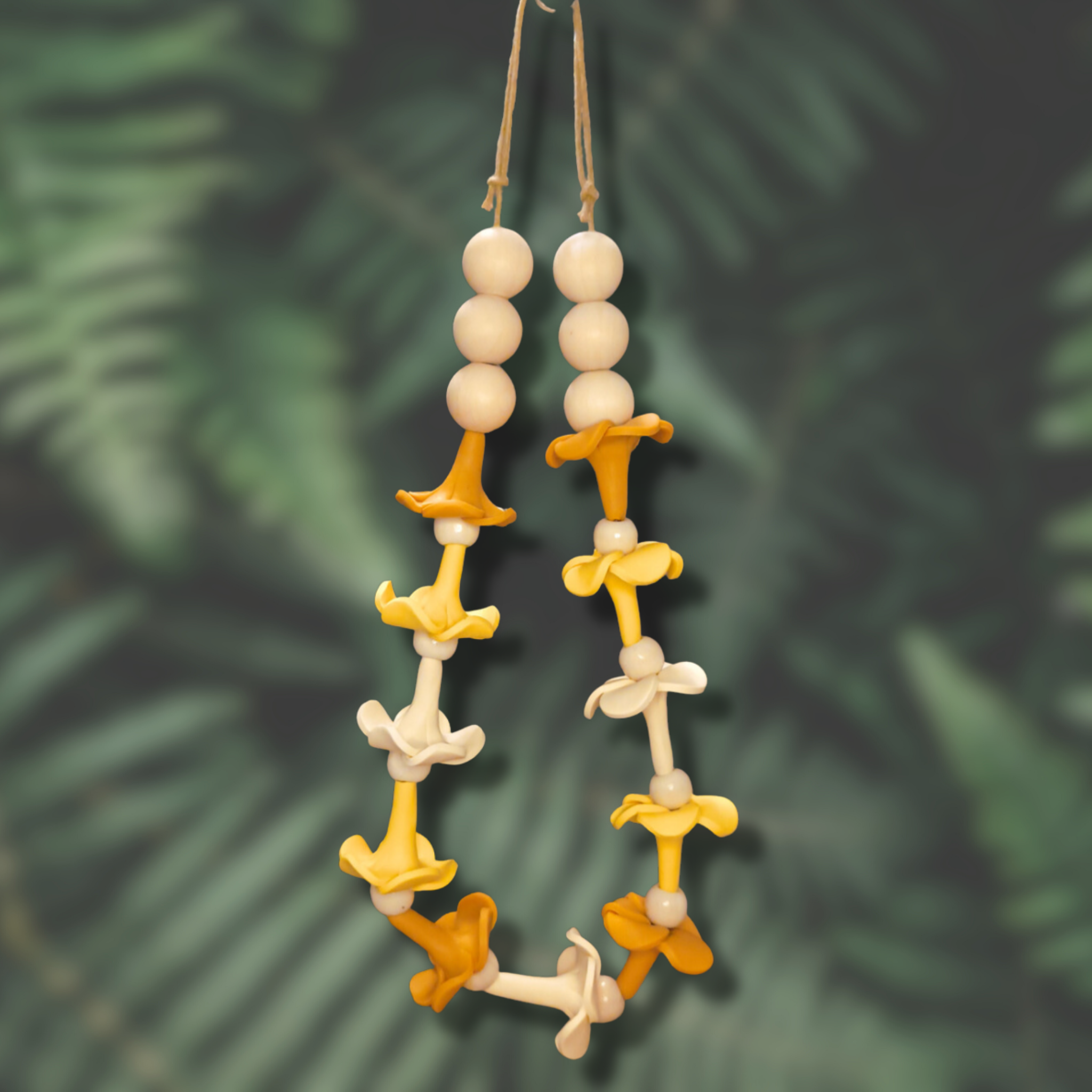 Car lei with handmade clay puakenikeni