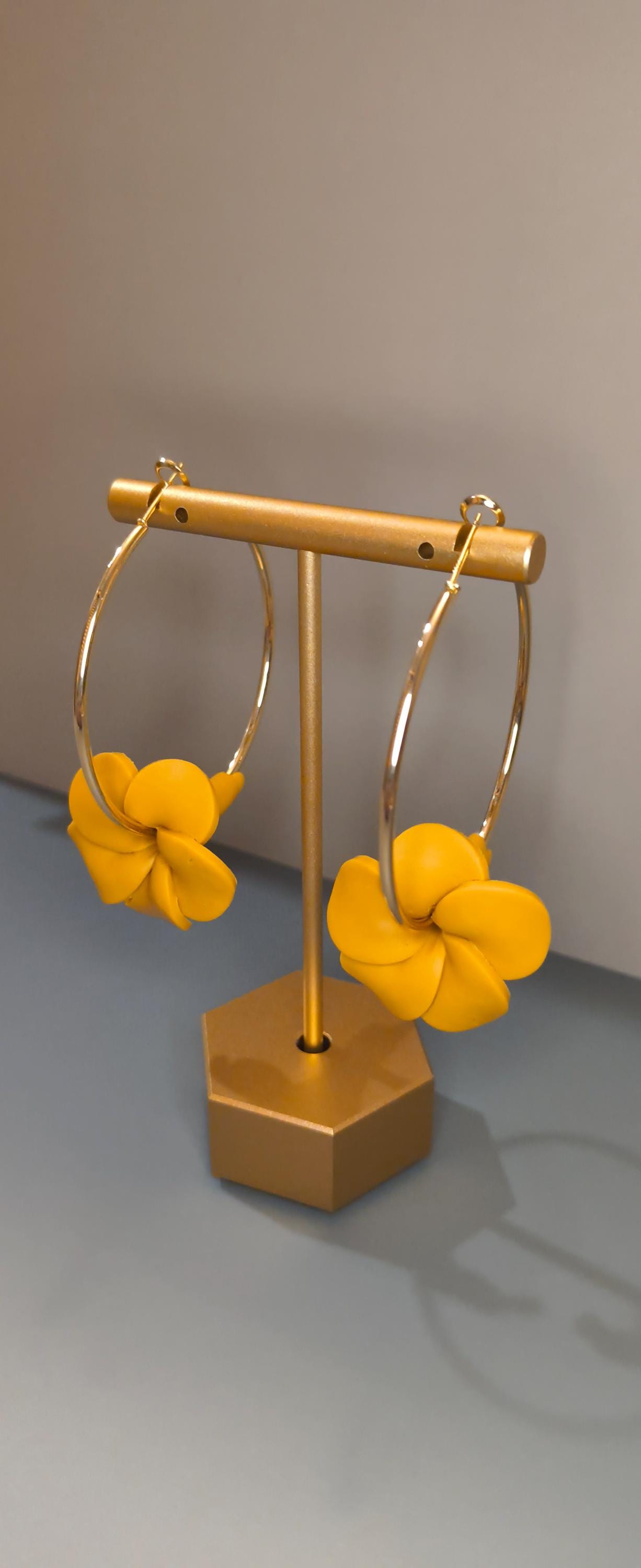 Hoop earrings with handmade clay puakenikeni