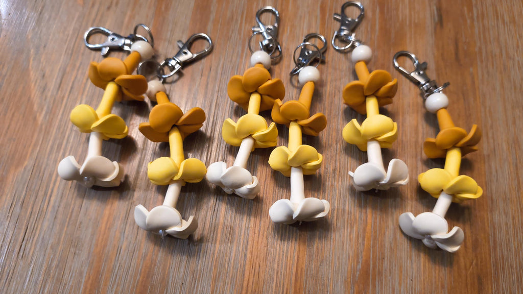 Keychain with handmade clay puakenikeni