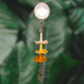 Badge reel with handmade clay puakenikeni