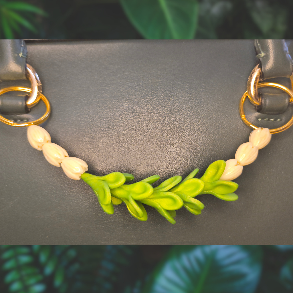 Pakalana and pikake bag lei