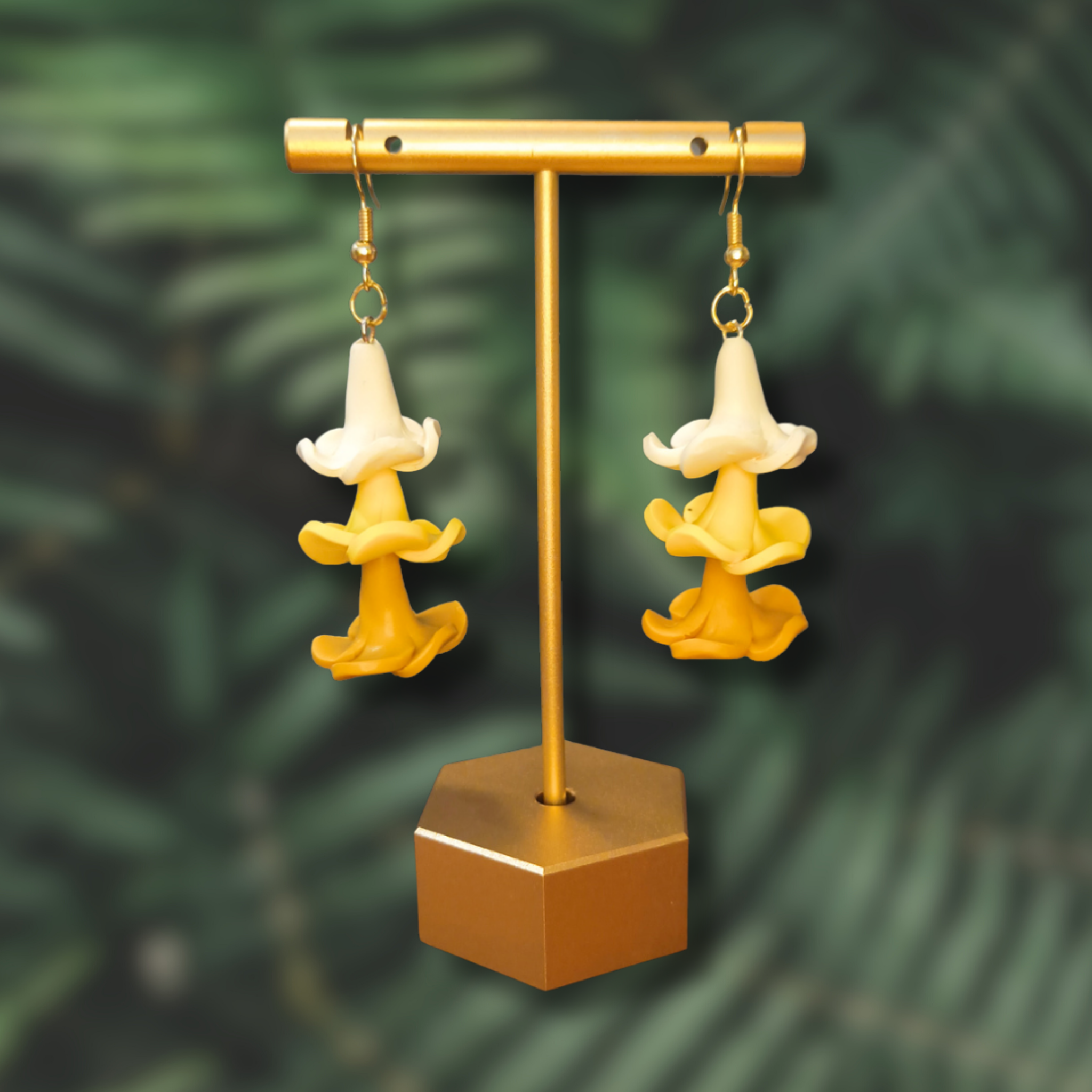 Drop earrings with handmade clay puakenikeni